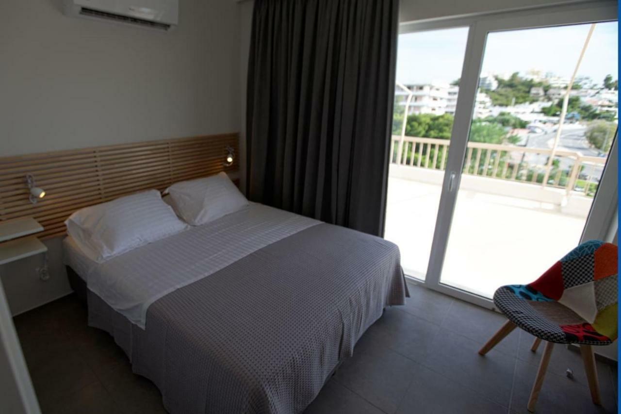 Seaside Renovated Top Floor Apartment Saronida Bagian luar foto